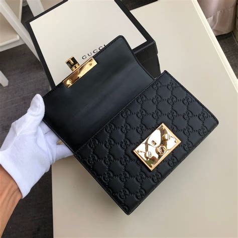 padlock small gucci signature shoulder bag black|Gucci bag with bee clasp.